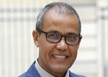 Abdelouahed Ben-Ncer of the National Institute of Archaeology and Heritage Sciences in Morocco poses with the casting of a jawbone of a Homo Sapiens discovered in Morocco on June 6, 2017 in Paris. 
Our human species already roamed Africa 300,000 years ago, sporting modern-looking faces that would not stand out in a crowd today, according to research published on June 7, 2017 that advanced Homo sapiens' origins by a hundred millennia. A groundbreaking fossil discovery in Morocco obliterates two decades of scientific consensus that our forefathers emerged in East Africa about 200,000 years ago, according to two studies published in the science journal Nature.
 / AFP PHOTO / PATRICK KOVARIK